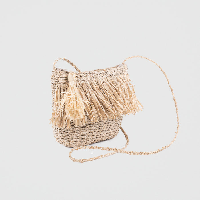 Seagrass light handbag with fringing detail. 135cm length strap (non-adjustable). Fully lined with zip closing. 