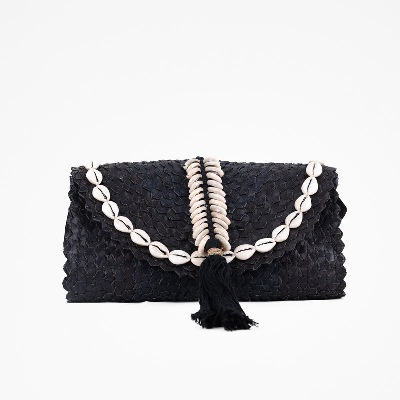 Seagrass black handbag with shell decoration and adjustable fabric shoulder straps. Fully lined. 