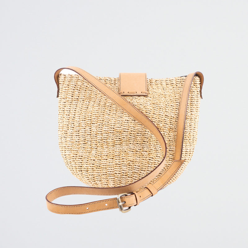 Large light natural seagrass handbag with adjustable leather shoulder straps. Zip & leather fastener closings. Fully lined with inside pocket.
