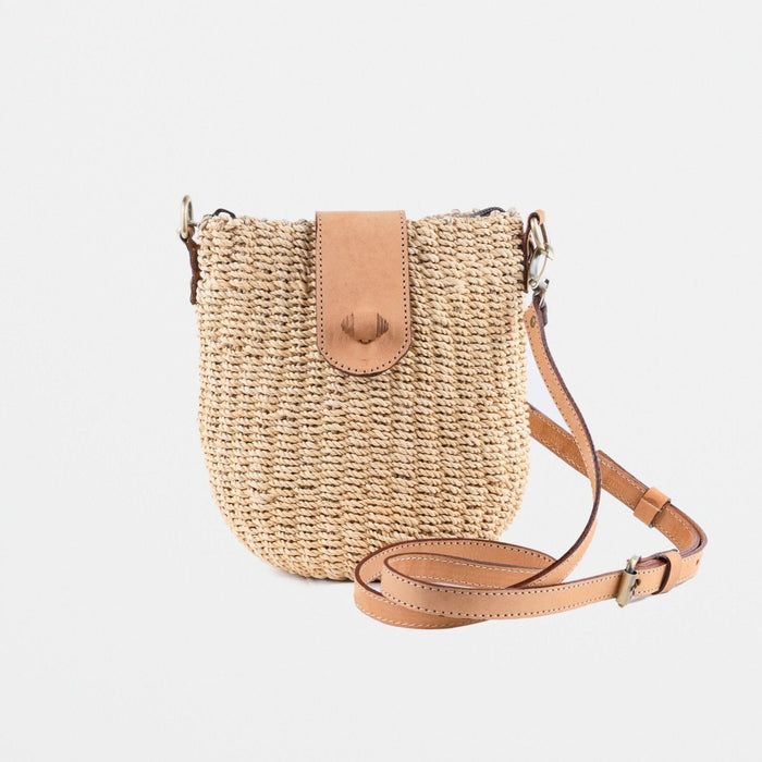Small seagrass light handbag with long length adjustable leather strap. Fully lined with inside pocket and both zip and magnetic fastener closings 