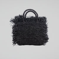 Black Square raffia bag with fringe and shell decorations. Handheld and fully lined with inside pocket. 