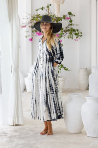 Womens button up mid length tie dye dress in cream featuring a tiered silhouette, 3/4 length sleeves and pockets 