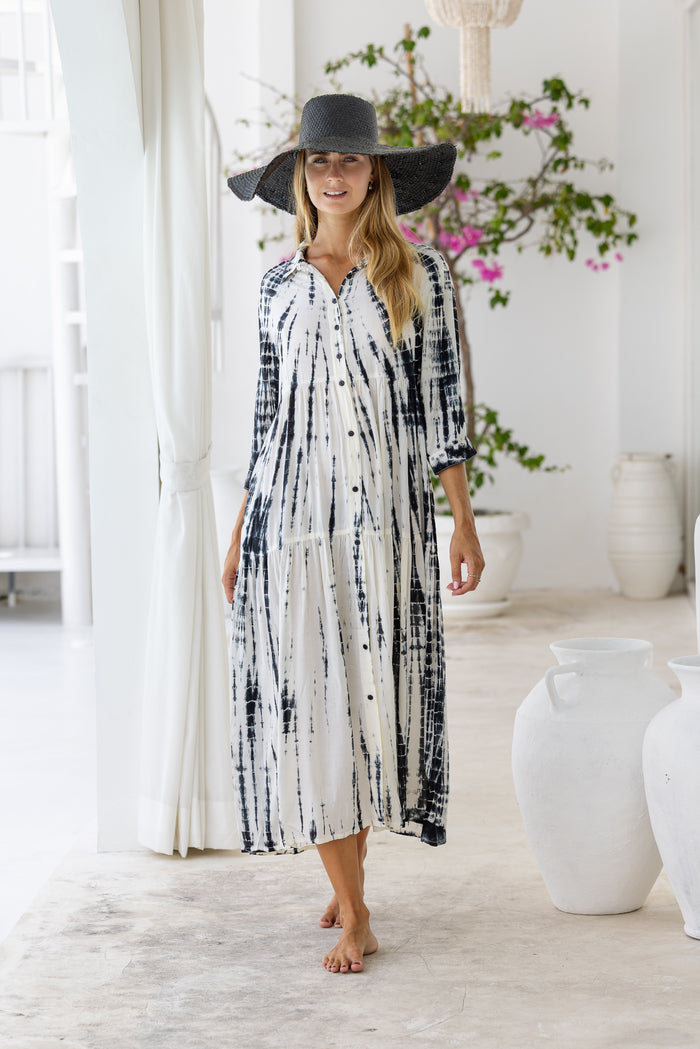 Womens button up mid length tie dye dress in cream featuring a tiered silhouette, 3/4 length sleeves and pockets 