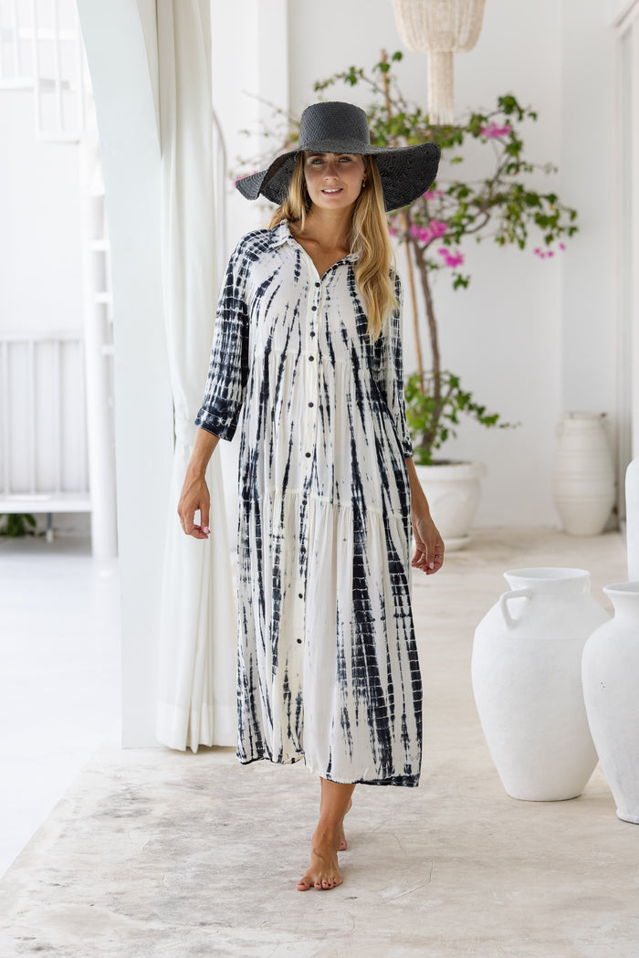 Womens button up mid length tie dye dress in cream featuring a tiered silhouette, 3/4 length sleeves and pockets 
