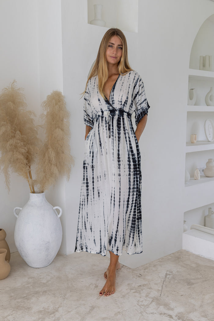 Womens mid length tie dye dress in cream featuring a hand beaded neckline, kimono sleeves, elasticated waist and pockets