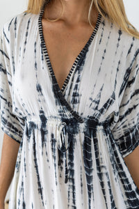 Womens mid length tie dye dress in cream featuring a hand beaded neckline, kimono sleeves, elasticated waist and pockets