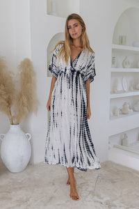 Womens mid length tie dye dress in cream featuring a hand beaded neckline, kimono sleeves, elasticated waist and pockets