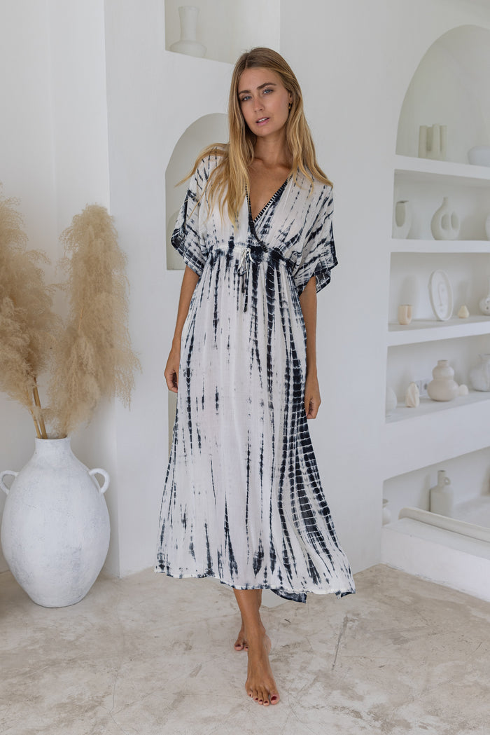 Womens mid length tie dye dress in cream featuring a hand beaded neckline, kimono sleeves, elasticated waist and pockets