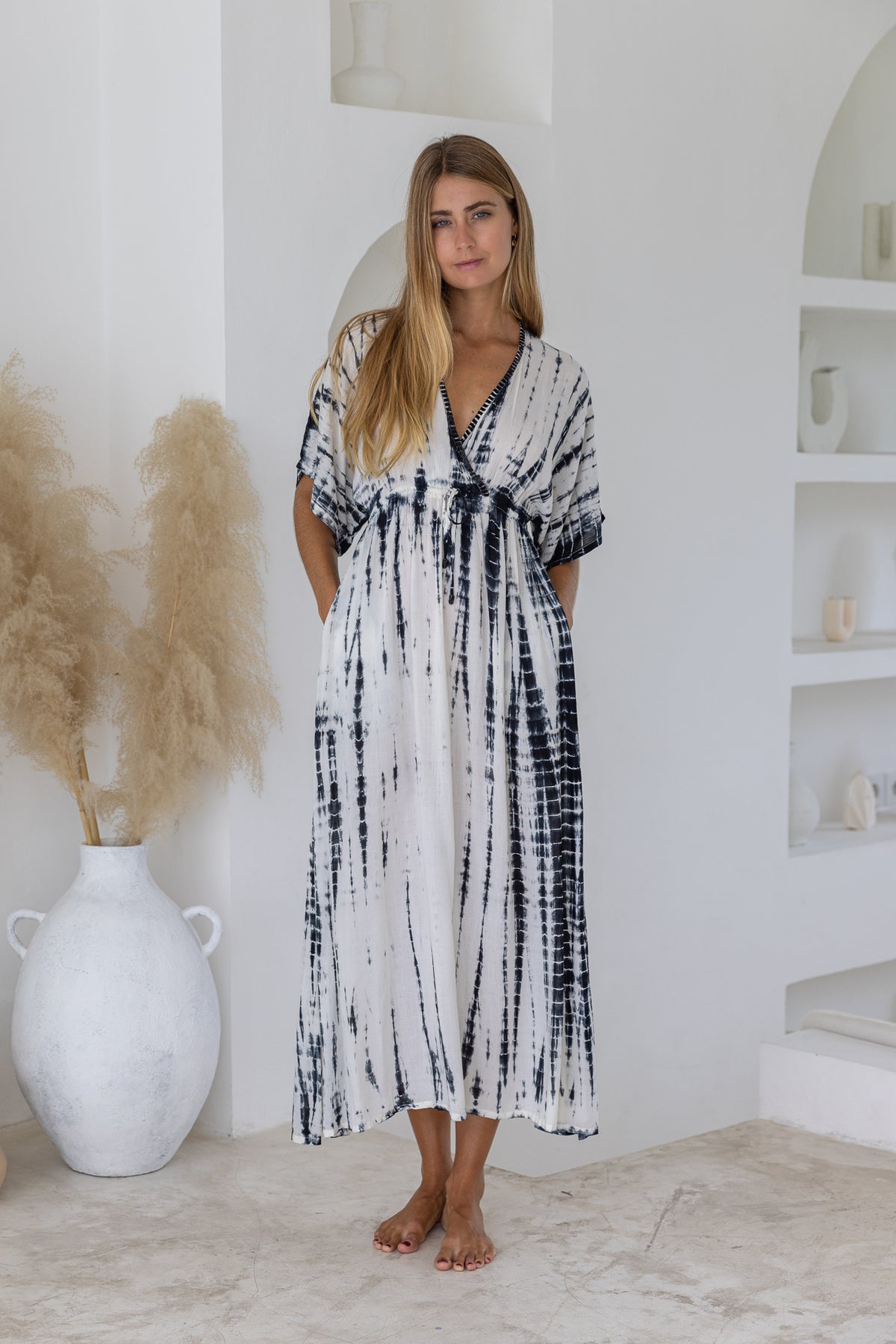 Womens mid length tie dye dress in cream featuring a hand beaded neckline, kimono sleeves, elasticated waist and pockets