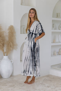 Womens mid length tie dye dress in cream featuring a hand beaded neckline, kimono sleeves, elasticated waist and pockets