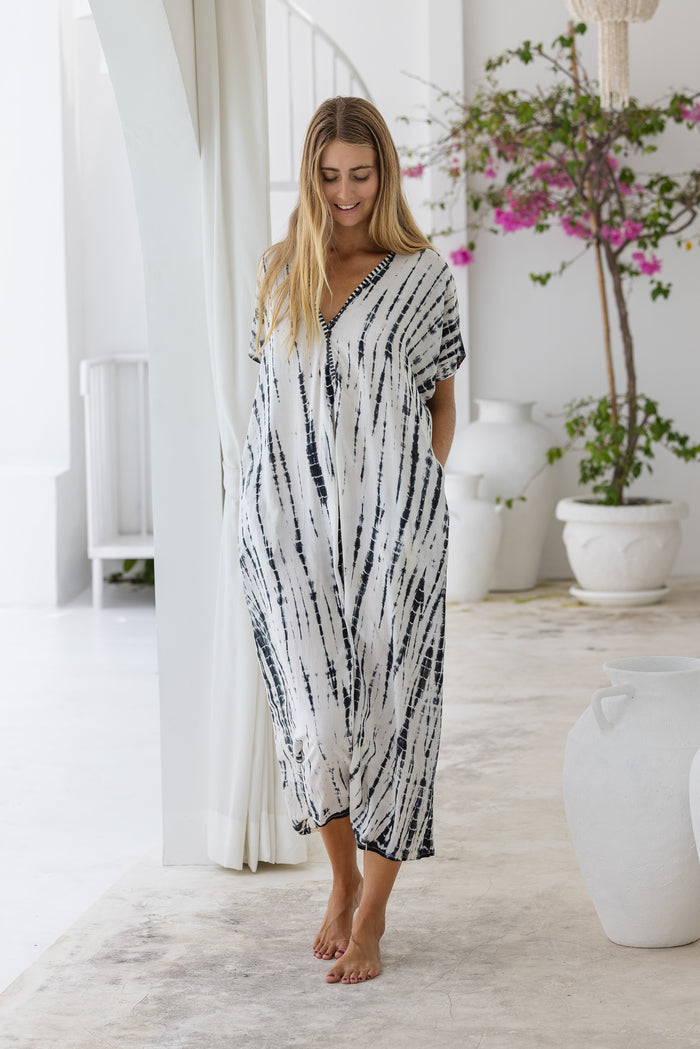 Womens mid length oversize tie dye kaftan in cream featuring a hand beaded neckline, short sleeves and pockets