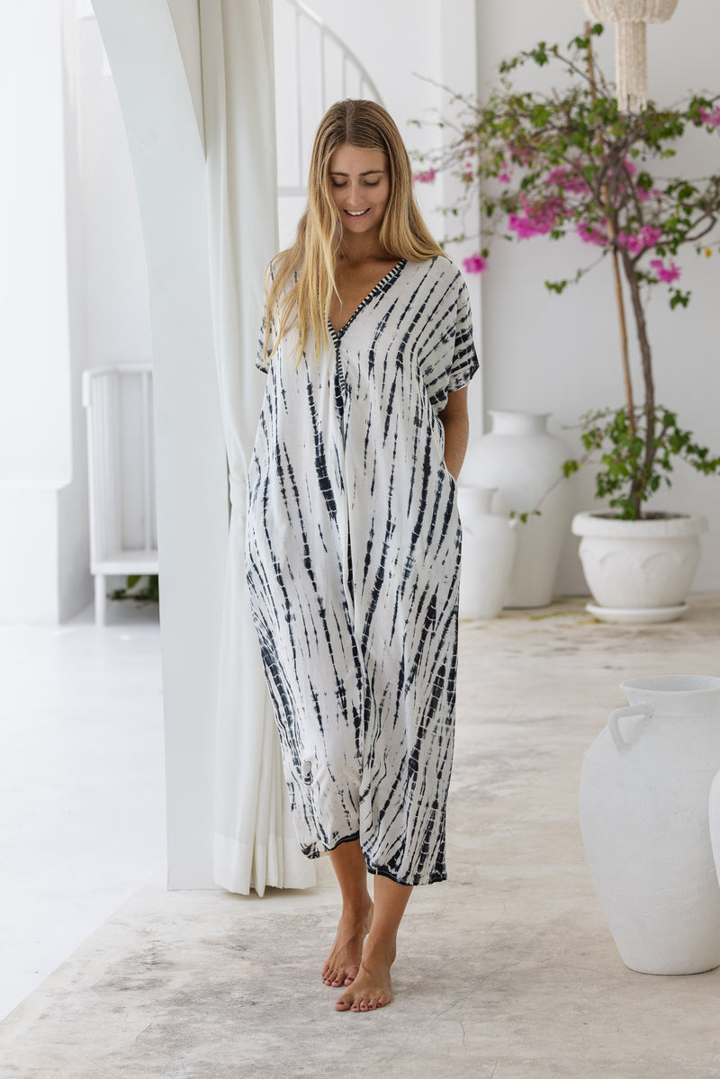 Womens mid length oversize tie dye kaftan in cream featuring a hand beaded neckline, short sleeves and pockets