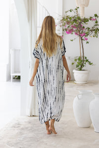 Womens mid length oversize tie dye kaftan in cream featuring a hand beaded neckline, short sleeves and pockets