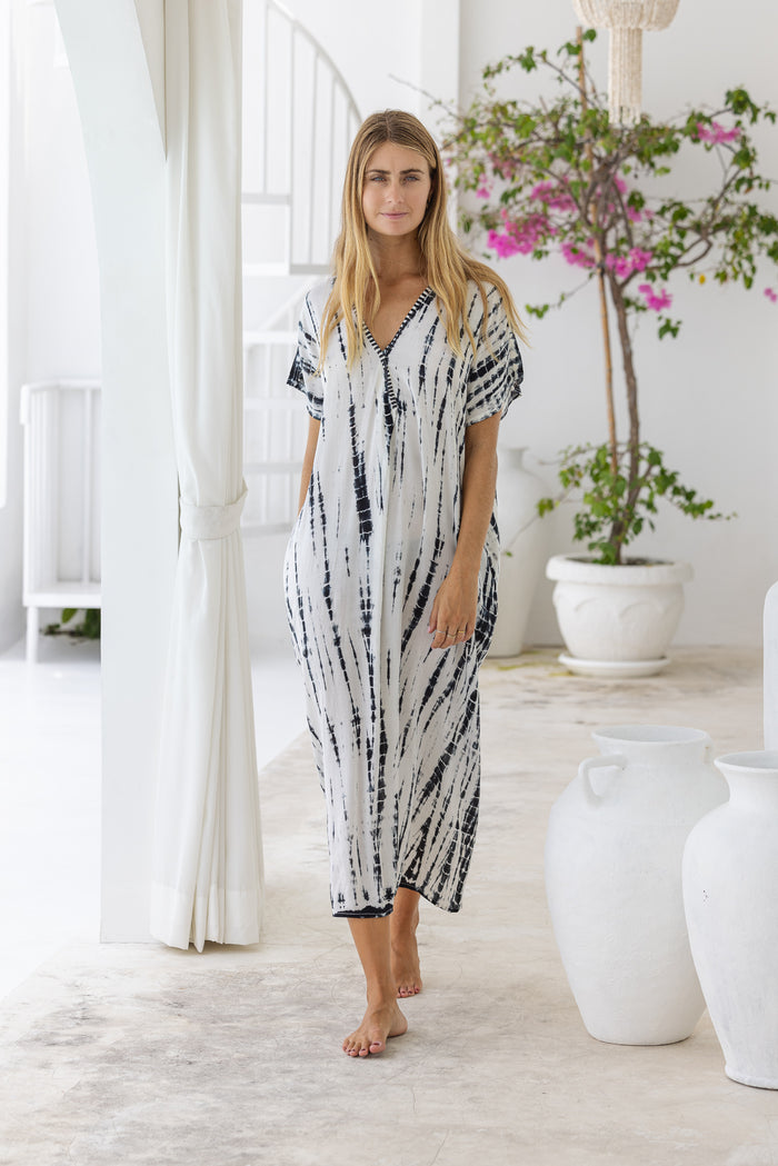 Womens mid length oversize tie dye kaftan in cream featuring a hand beaded neckline, short sleeves and pockets
