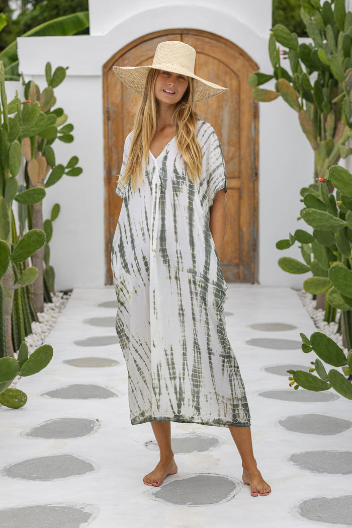 Womens mid length oversize tie dye kaftan in khaki and cream featuring a hand beaded neckline, short sleeves and pockets