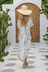 Womens mid length oversize tie dye kaftan in khaki and cream featuring a hand beaded neckline, short sleeves and pockets
