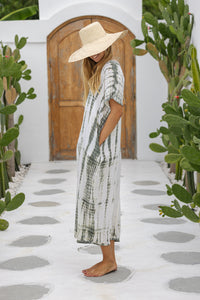 Womens mid length oversize tie dye kaftan in khaki and cream featuring a hand beaded neckline, short sleeves and pockets