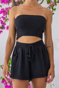 Womens super soft, 100% cotton relaxed Boxer Shorts in black featuring an elasticated waist, with a pull tie decoration and side pockets