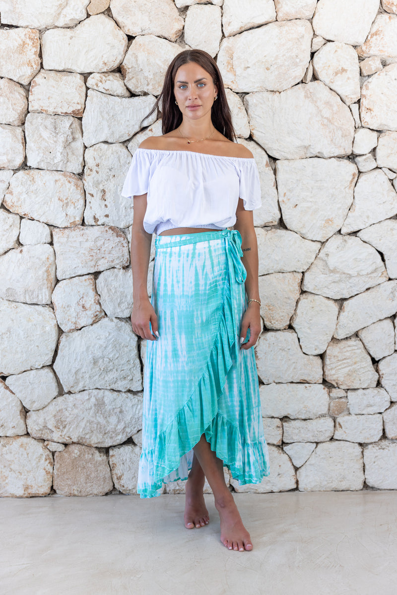 Womens long length tie dye wrap skirt in aqua blue featuring a self tie fastening and ruffle detail