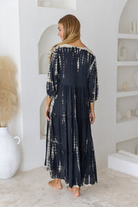 womens mid length tie dye tiered tunic dress in black featuring a v neckline, long sleeves and side pockets