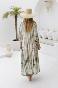 womens mid length tie dye tiered tunic dress in khaki and cream featuring a v neckline, long sleeves and side pockets