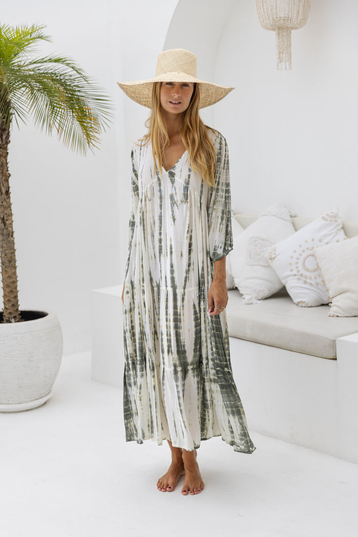 womens mid length tie dye tiered tunic dress in khaki and cream featuring a v neckline, long sleeves and side pockets