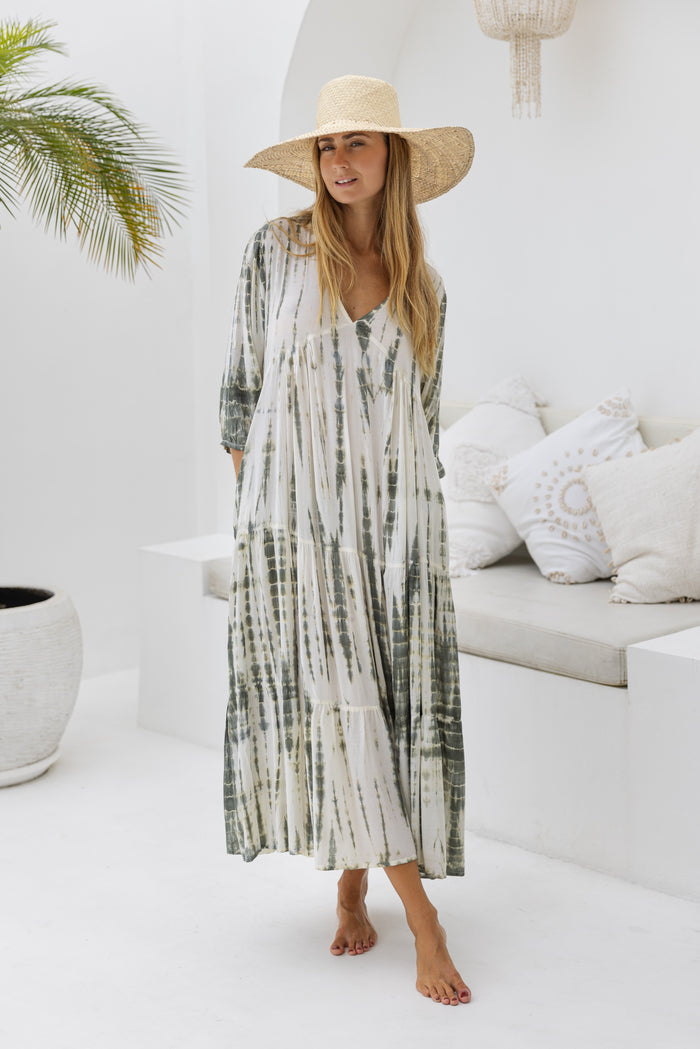 womens mid length tie dye tiered tunic dress in khaki and cream featuring a v neckline, long sleeves and side pockets