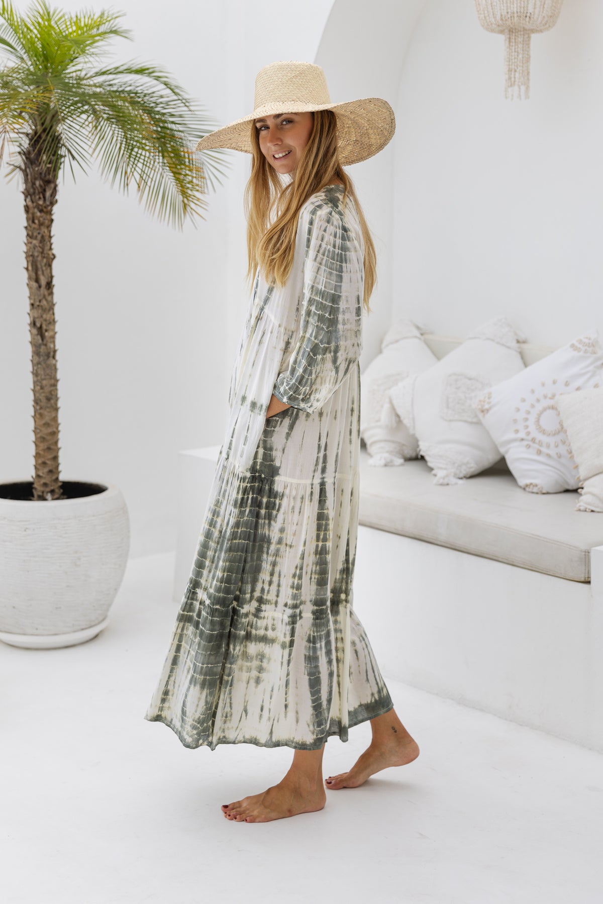womens mid length tie dye tiered tunic dress in khaki and cream featuring a v neckline, long sleeves and side pockets