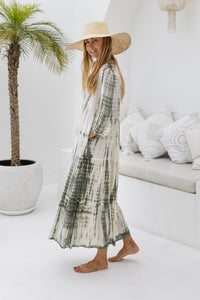 womens mid length tie dye tiered tunic dress in khaki and cream featuring a v neckline, long sleeves and side pockets