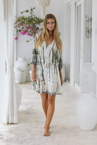 womens mid length tie dye tiered tunic dress in khaki and cream featuring a v neckline, long sleeves and side pockets