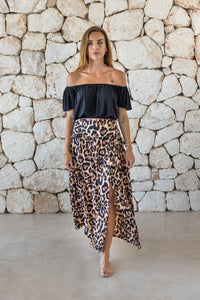 Womens stylish, lightweight and super soft long length skirt in big leopard print featuring an elasticated waist at the back and front/side split