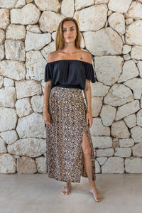 Womens stylish, lightweight and super soft long length skirt in leopard print featuring an elasticated waist at the back and front/side split