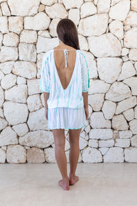 Womens stylish, super soft, lightweight, short length kaftan tie dye dress in aqua blue featuring an elasticated waist and hand beaded v neckline