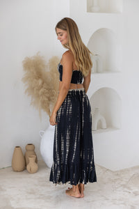 womens tie dye skirt in black featuring a smocked waist and button down front closing