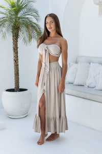 Womens super soft, comfortable and flattering Lorena Skirt in beige featuring a smocked waist and button down front closing