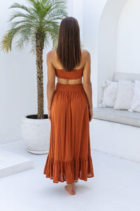 Womens super soft, comfortable and flattering Lorena Skirt in terracotta featuring a smocked waist and button down front closing