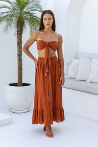 Womens super soft, comfortable and flattering Lorena Skirt in terracotta featuring a smocked waist and button down front closing