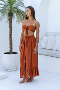 Womens super soft, comfortable and flattering Lorena Skirt in terracotta featuring a smocked waist and button down front closing