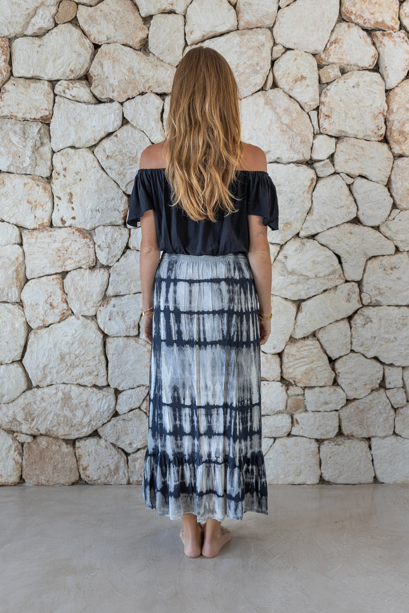 Womens tie dye skirt in grey featuring a smocked waist and button down front closing