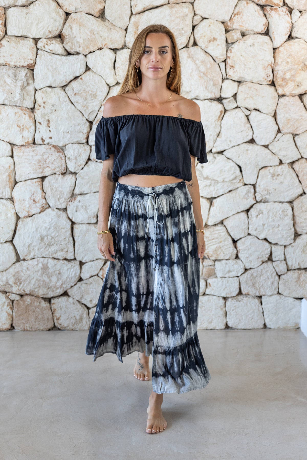 Womens tie dye skirt in grey featuring a smocked waist and button down front closing