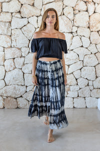 Womens tie dye skirt in grey featuring a smocked waist and button down front closing