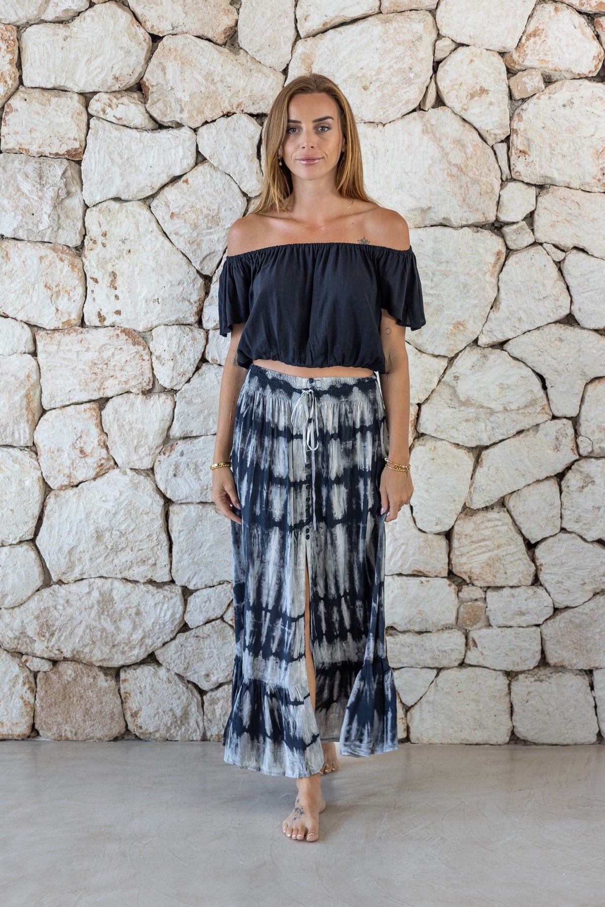 Womens tie dye skirt in grey featuring a smocked waist and button down front closing