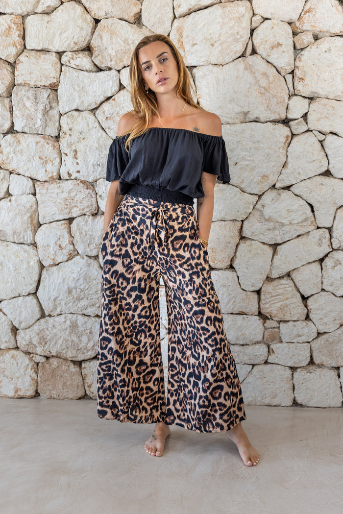 Stylish, super soft wide leg culotte style trousers in big leopard print featuring an elasticated waist, belt detail and pockets for a flattering and comfortable fit