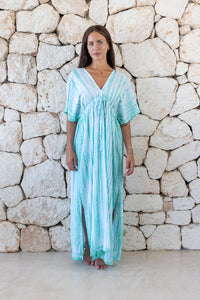 Womens overisze maxi length tie dye kaftan in aqua blue featuring a hand beaded neckline and pull tie detail