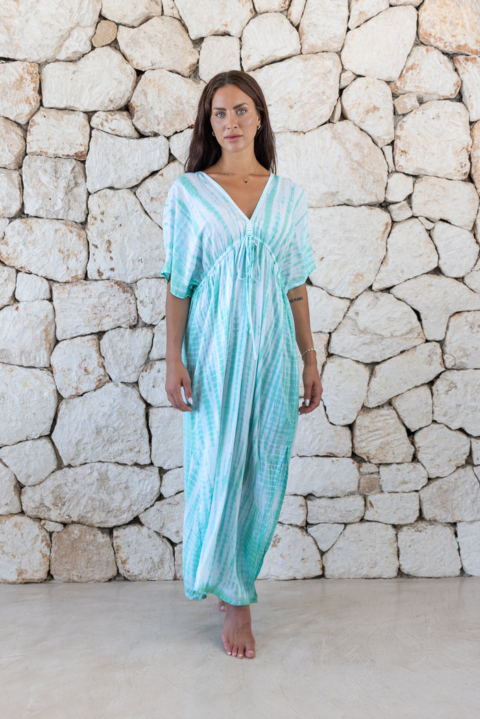 Womens overisze maxi length tie dye kaftan in aqua blue featuring a hand beaded neckline and pull tie detail