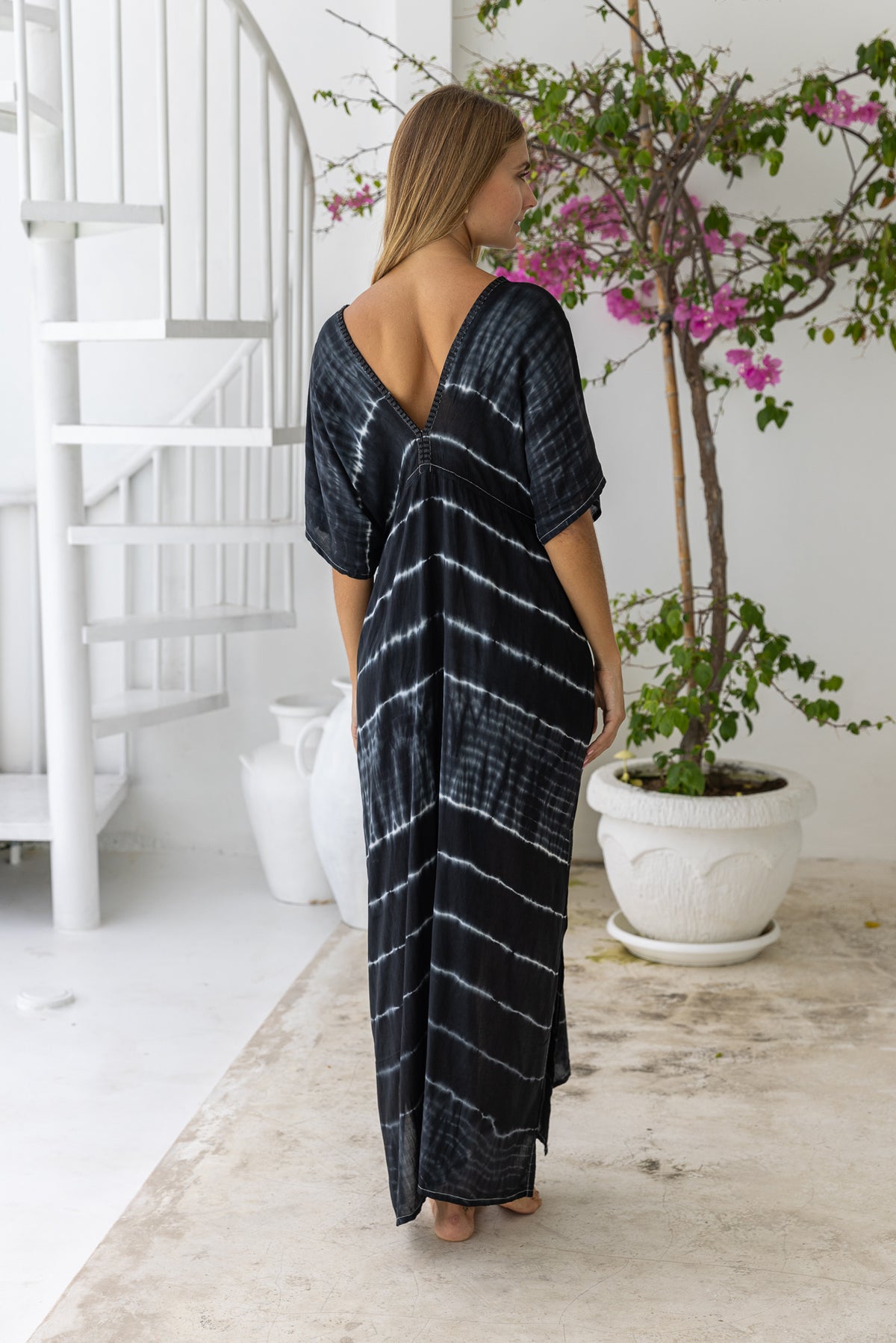 womens oversize maxi length tie dye kaftan in ink black and featuring a hand beaded neckline, pull tie detail and side pockets

