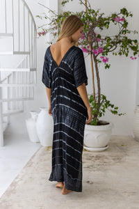 womens oversize maxi length tie dye kaftan in ink black and featuring a hand beaded neckline, pull tie detail and side pockets

