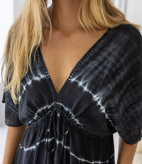 womens oversize maxi length tie dye kaftan in ink black and featuring a hand beaded neckline, pull tie detail and side pockets

