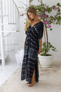 womens oversize maxi length tie dye kaftan in ink black and featuring a hand beaded neckline, pull tie detail and side pockets

