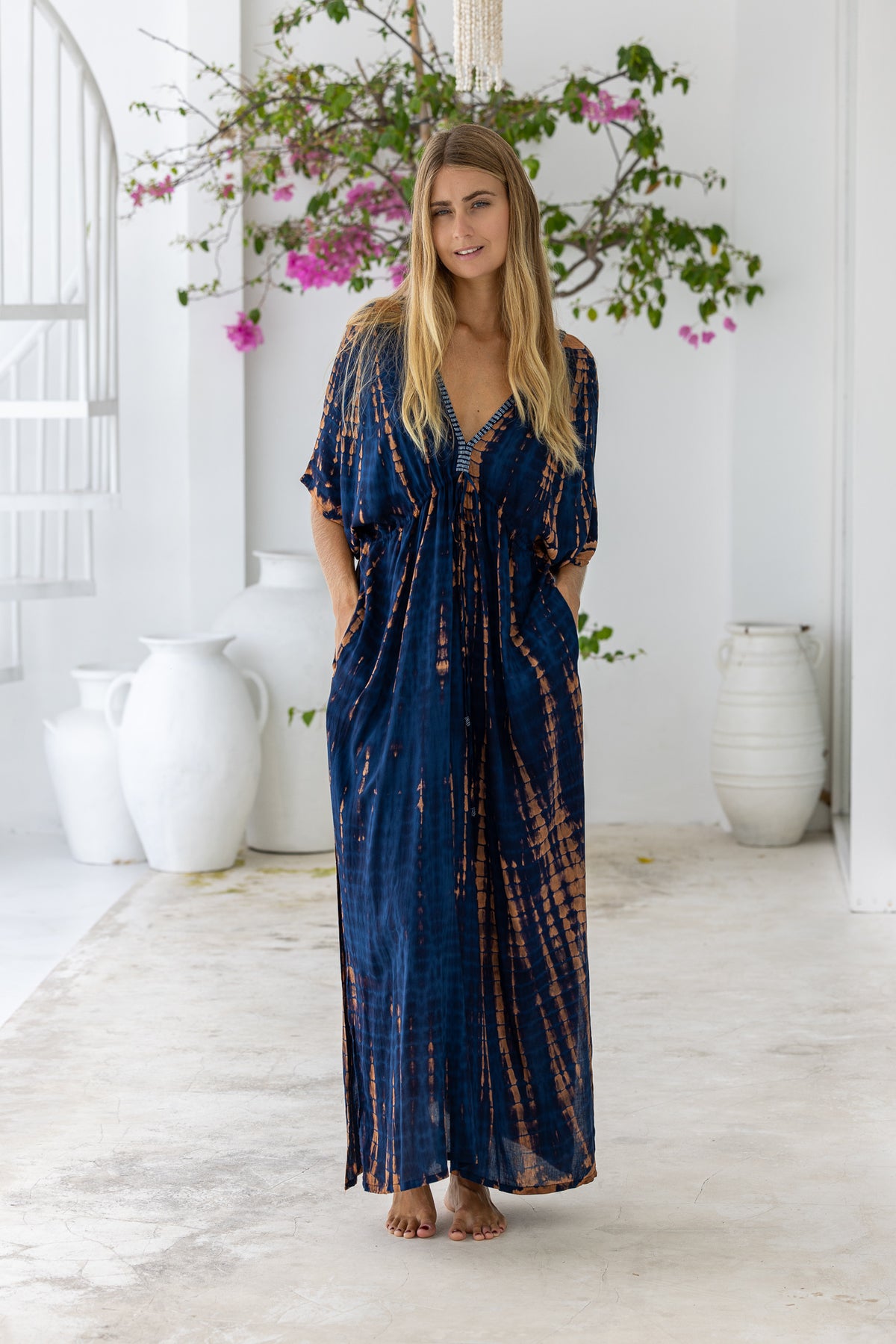 womens oversize maxi length tie dye kaftan in navy blue and brown and featuring a hand beaded neckline, pull tie detail and side pockets

